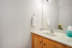 The Convenient Half Bath on the Main Level is the Perfect Spot to Freshen Up Before You Venture Out for a Day in SoHa